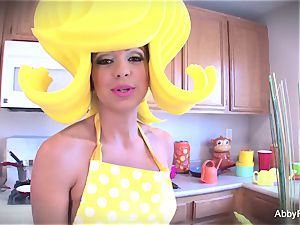 cartoon style Abigail Mac getting off in the kitchen