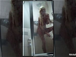 Home movie of Nikita Von James taking a bathroom